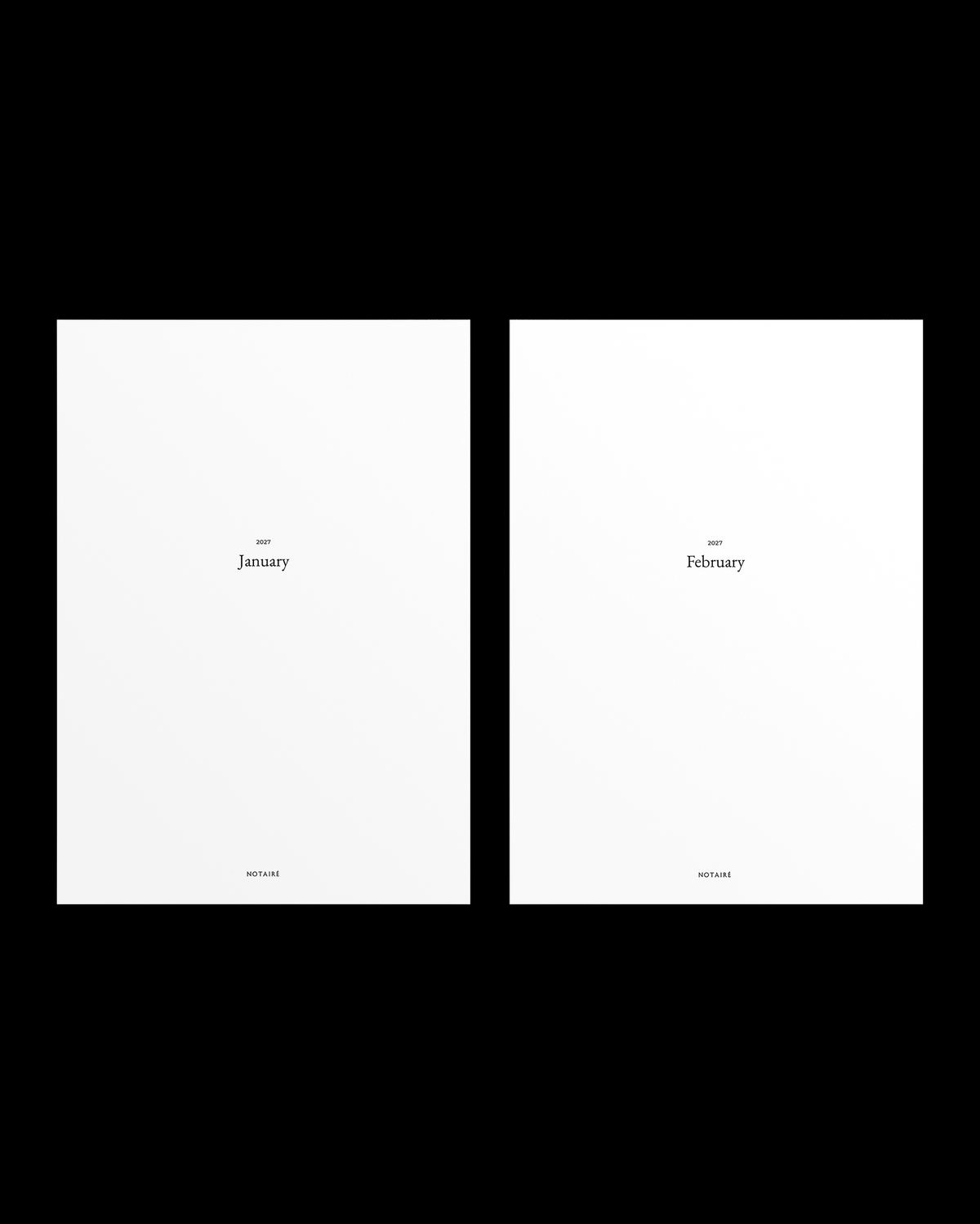 Two minimalist white Notairé inserts  shown side by side on a black background, each with small centered text reading 'the January' and 'the February' and tiny 'Notairé' branding near the bottom.