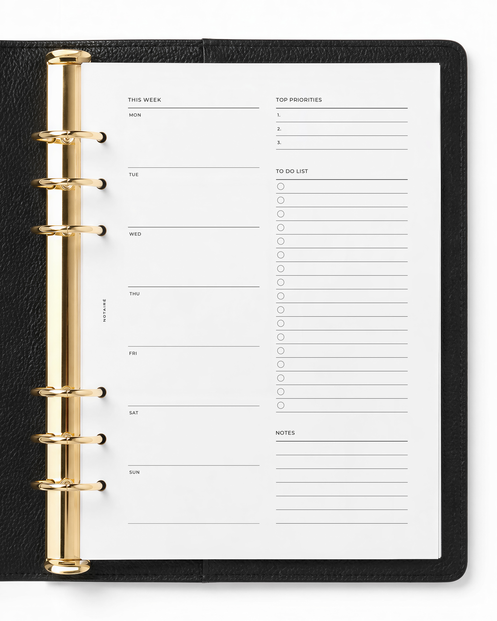 An open black leather-bound ring binder planner showing a white Notairé weekly planner page with gold-tone metal rings on a white background.